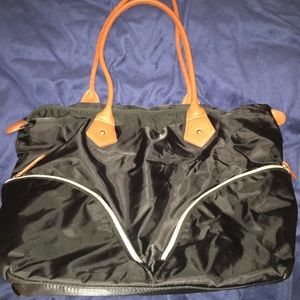 Black nylon bag with faux leather details